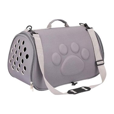 Транспортувальна сумка для тварин - легка переносна сумка для цуценят та маленьких собак, сірого кольору. Підходить для подорожей, прогулянок, відпочинку на природі, авіаперельотів, відвідування ветеринара.