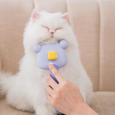 Самоочищувана щітка для вичісування шерсті у формі ведмедика. Покращує кровообіг, легко чиститься. Підходить для всіх типів шерсті котів та собак з довгою шерстю (фіолетовий)