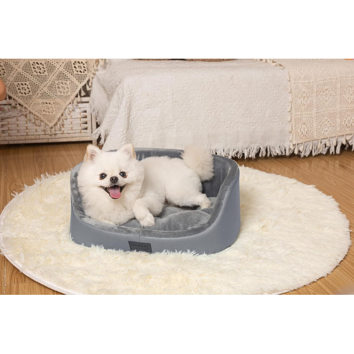 Кругле ліжко для собак середнього розміру Raikou, м'яке та зручне, з неслизьким покриттям. Підходить для собак та котів середніх та маленьких порід. Колір: темно-сірий, розмір: 45 x 34 x 17 см