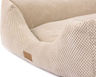 М'яке ліжко для собак та котів Oaza з бортиком, 70x60 см, кремового кольору